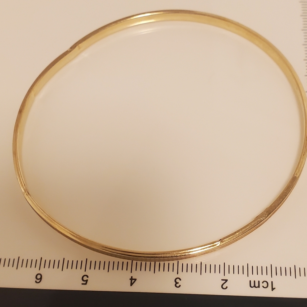 Two 14 kt gold bracelets